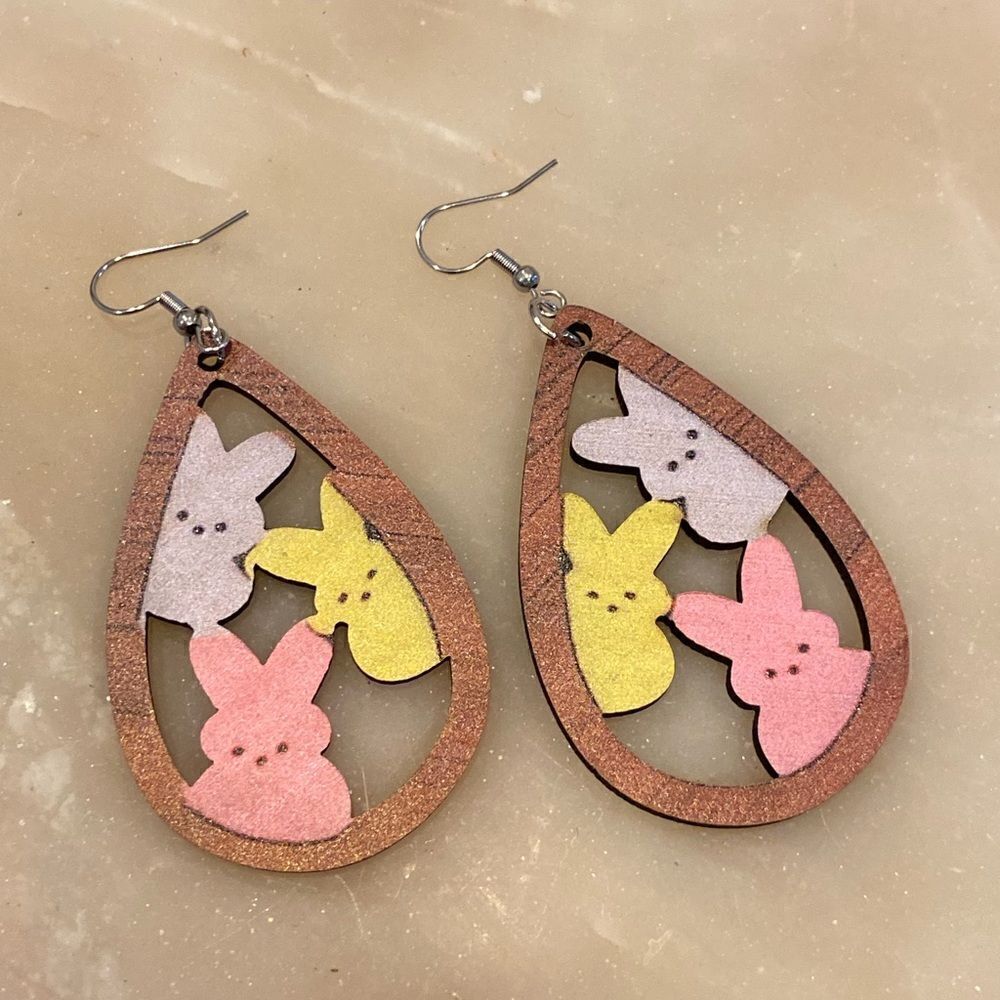 Easter earring featuring keep bunnies in a teardrop style